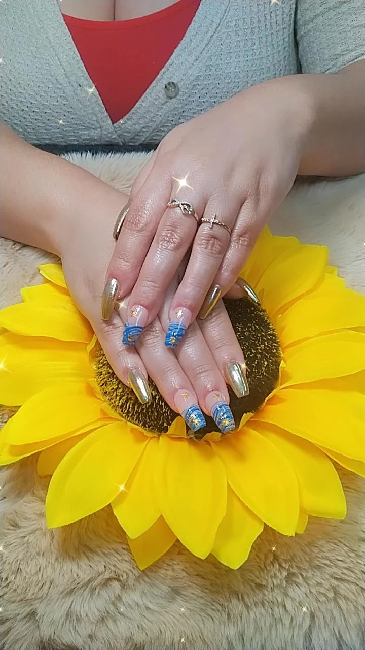 Coastal Nails nail design by Olga's Unisex Salon & Nail Spa in New York