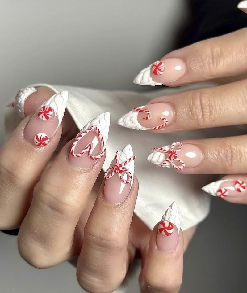 Stiletto Nails nail design by Q's studios in Miami
