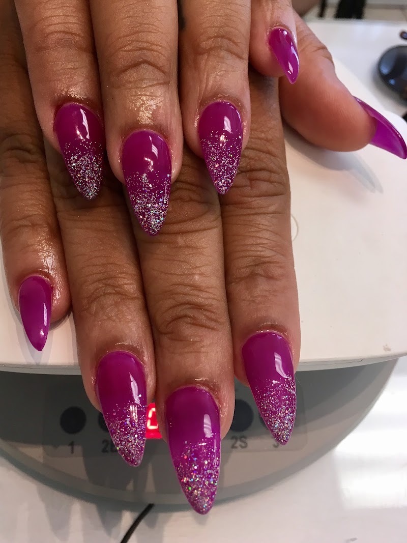Stiletto Nails nail design by HM Nail Salon in Miami