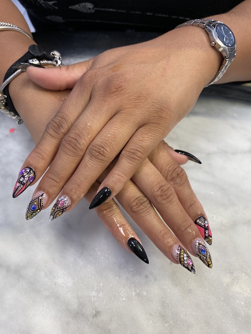 Stiletto Nails nail design by Sky Nails in Miami